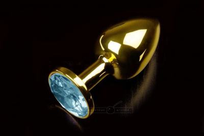 Пикантные штучки - Маленькая золотистая анальная пробка с кристаллом, 7х2.5 см (голубой) 
